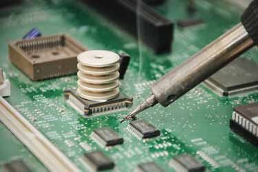 PCB components are placed onto the circuit board during PCB assembly